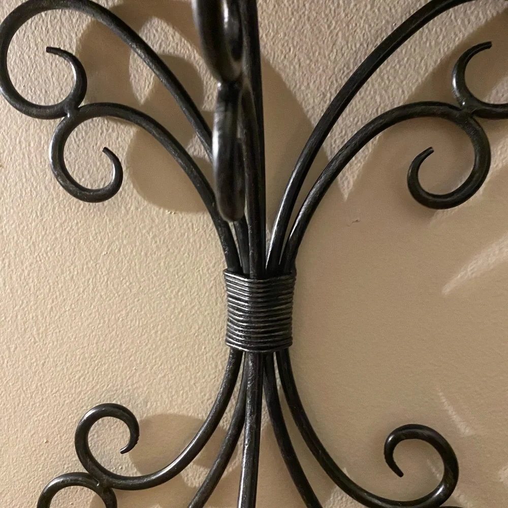 Brown and black iron and wood wall shelf